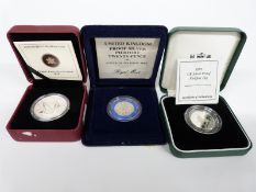 Three silver proof Piedfort coins 1992 10p, 1982 20p and a 2010 Canada 5 dollar coin, all cased with