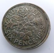 Elizabeth II 1958 sixpence mis-strike, part plain edge, with rim and off centre struck