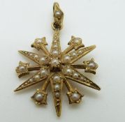Edwardian 15ct gold pendant in the form of a star set with seed pearls
