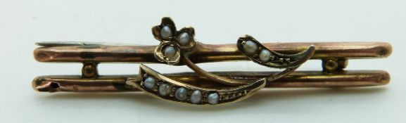 A 9ct gold brooch set with seed pearls, 1.9g