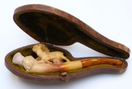 A carved miniature Meerschaum pipe with deer surmount, in original case, 9cm