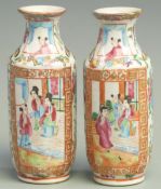 A pair of Chinese Cantonese famille rose vases decorated with court scenes, 15cm tall