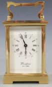 Twentieth century brass carriage clock by Woodford, the white Roman dial with Arabic minutes and
