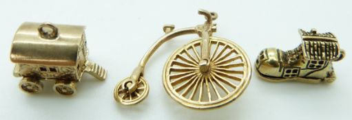 Three 9ct gold charms comprising penny farthing, caravan and a shoe, 8.5g