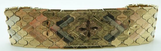 A 14ct gold bracelet made up of textured tri-coloured links, 56.5g