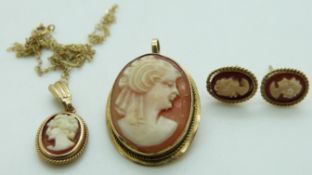 A 9ct gold brooch/ pendant set with a cameo, matching earrings and pendant