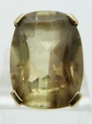A 9ct gold ring set with a smoky quartz