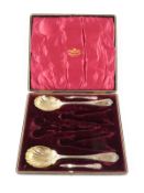 Mappin & Webb cased hallmarked silver nut or dessert set comprising spoon with gilt shell shaped