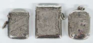 Three Victorian and later hallmarked silver vesta cases, Chester 1901, Birmingham 1910 and