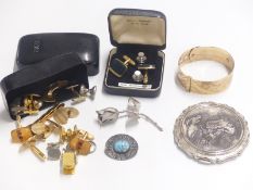 A collection of costume jewellery to include cufflinks, rolled gold bangle, Stratton compact etc