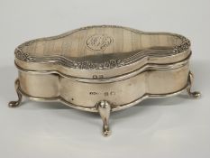 George V hallmarked silver quatrefoil shaped footed trinket or jewellery box with pleated silk