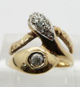 A 14ct gold ring set with paste in the form of a snake, size L