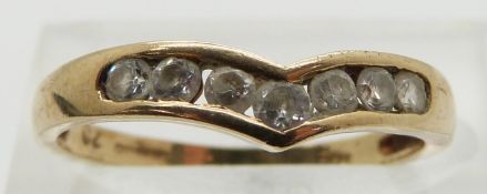 A 9ct gold ring set with paste in a cluster, size L
