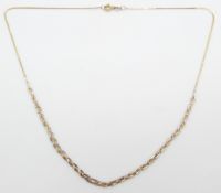 A 9ct gold necklace with tri-coloured plaited design, 1.8g