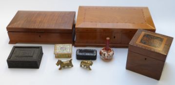 A collection of boxes including inlaid bog wood style.