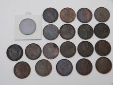 A collection of twenty 1880s young head Victorian bronze pennies, mostly VF or better, includes some