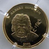 Albert Einstein miniature 585 gold coin, 0.5g, 11mm diameter, with certificate