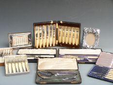 A quantity of cased silver plated cutlery, perpetual calendar, photograph frame etc