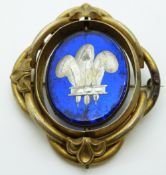 Victorian pinchbeck brooch set with a plaque depicting the Prince of Wales' heraldic badge