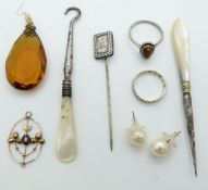 A Edwardian 9ct gold pendant,  9ct gold and silver ring, silver ring set with tiger's eye, Victorian