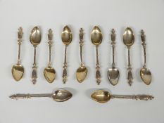 Set of 11 continental white metal teaspoon, some marked 800 to back of bowl, weight 95g