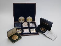 Eight 'oversize' and supersize commemorative coins, some with gold plating etc., some cased with