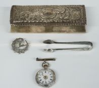 A ladies silver pocket watch marked 925, a hallmarked silver Manx/Isle of Man brooch and a