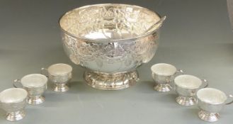 A large plated pedestal punch bowl, six cups with liners and ladle