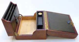 A 19th C tooled leather writing slope with fitted interior, additional hinged lift up stationery