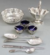 A quantity of silver plate to include berry spoons, swing handled bowl, salts etc