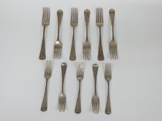 A quantity of Georgian Old English pattern hallmarked silver forks comprising a set of six table