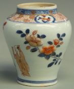 A 19thC Chinese baluster vase decorated with prunus blossom in relief with a scholar and child,