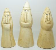 Three 19thC African carved ivory tribal figures, possibly chess pieces, tallest 11.5cm