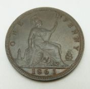 1861 Victorian young head bronze penny, LCW below shield, four windows to lighthouse, thumb