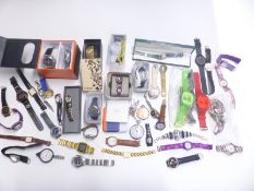 Over 40 various ladies and gentleman's wristwatches including Fossil, Sekonda, Timex etc, some in