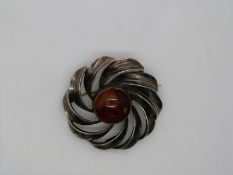 Danish silver brooch set with pressed amber by Carl Ove Frydensberg