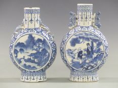 Two 19thC Chinese moon flasks decorated with floral landscapes, height 22cm