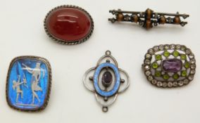 Three brooches variously set with butterfly wing and figures, tiger's eye, and an agate cabochon,