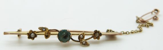 A 9ct gold brooch set with seed pearls and a quartz