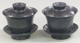 A pair of Chinese carved / turned hardstone cups, underplates and covers, with boxes, height 9.5cm