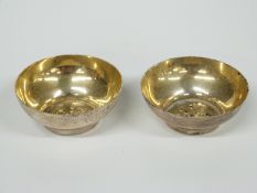 A pair of Mappin & Webb Victorian hallmarked silver open salts, London 1888, diameter 4.5cm, 25g