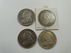 Four Victorian crowns comprising a run of veiled head examples 1895, 1896, 1897 and 1898