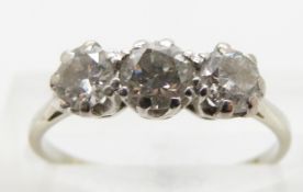 An 18ct white gold ring set with three round cut diamond, approximately 0.4ct, 0.3ct & 0.3ct