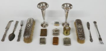 Two hallmarked silver trumpet vases, two hallmarked silver mounted brushes, plated and other vestas,