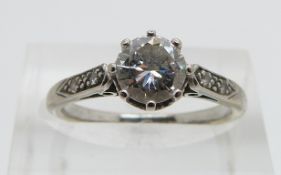 Art Deco 18ct white gold ring set with a diamond of approximately 0.8ct with further diamonds to the