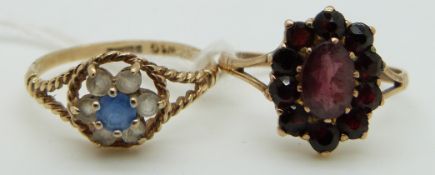 A 9ct gold ring set with garnets and a 9ct gold ring set with paste