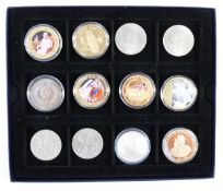 Twelve various modern commemorative crowns, includes gold plated Titanic five pounds etc