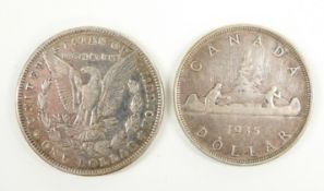1889 Morgan dollar together with a George V 1935 Canadian dollar
