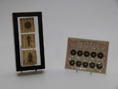 Ten Chinese 'cash' coins together with a museum display of reproduction 7th century 'utensil' shaped