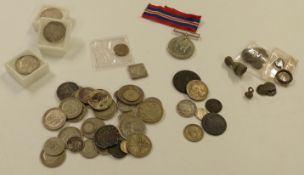 An interesting collection of coins, tokens, Roman artefacts and a WWII War Medal etc., some silver